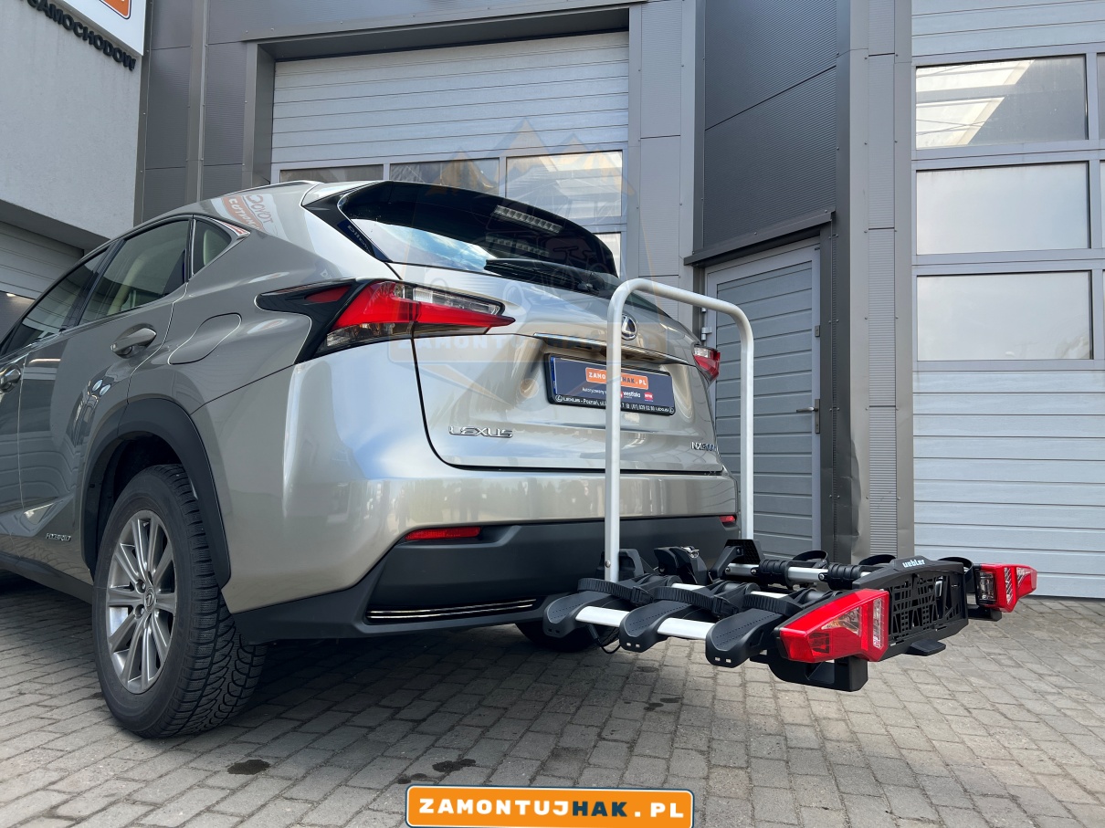 Podróżuj komfortowo i bezpiecznie dzięki bagażnikowi rowerowemu Uebler i31 na Lexusie NX. ZamontujHak.pl - Twój specjalista od montażu